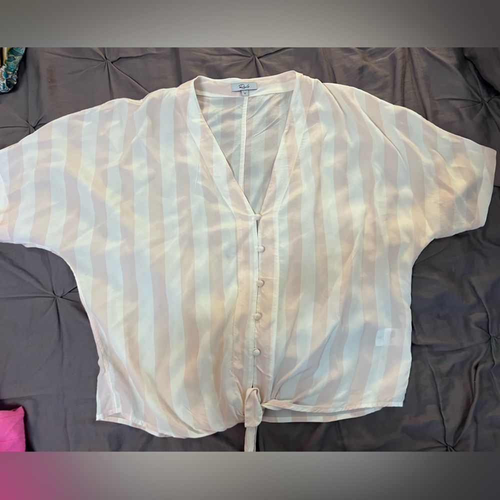 Stripped pink and white blouse.